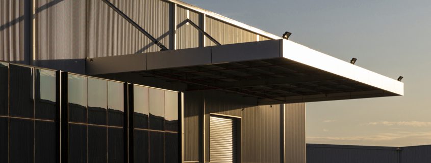 industrial modern building at sunset