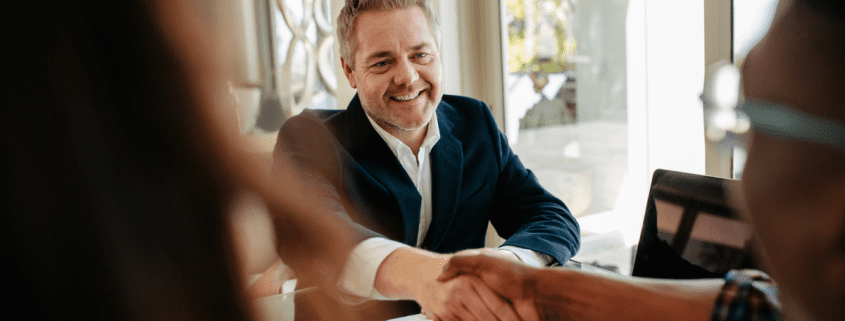 businessman shaking someone's hand