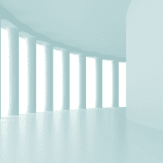 white architecture pillars in long hallway