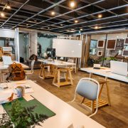 urban office space with wood paneling and greenery