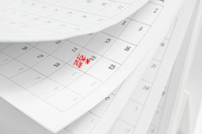pages of calendar flipping to show refinance and loan due dates