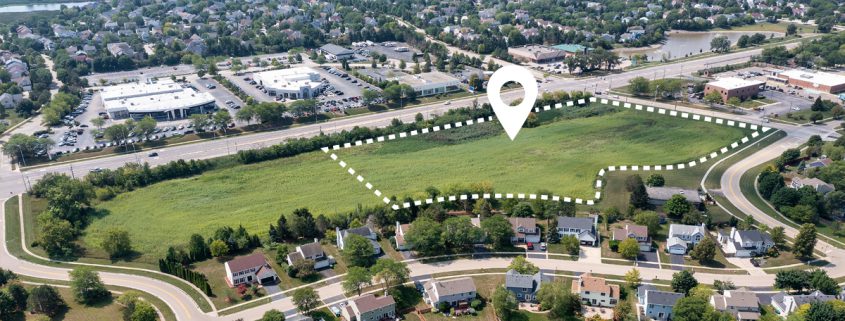 Aerial of neighborhood with outline of potential industrial development site