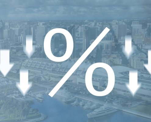 percent symbol surrounded by down arrows on a faded blue background of the San Diego skyline