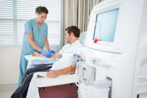 nurse with patient receiving outpatient medical services