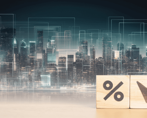 Percentage rate with down arrow over skyline of commercial buildings