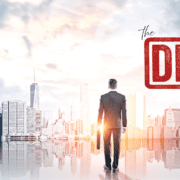 DIY_blog Businessman standing facing a city skyline with a DIY trap stamp overlay