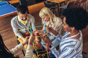 office team building activity in the lounge