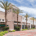 empty outdoor retail shopping center with beautiful palm trees