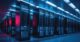 A server room illuminated with blue and red lights, highlighting the data center infrastructure and the critical role of technology in modern data management systems