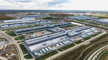 Large AI data center campus with multiple buildings and cooling units