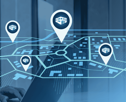 A map with several property locations marked overlayed on an image of a woman working on a laptop