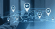 A map with several property locations marked overlayed on an image of a woman working on a laptop