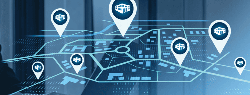 A map with several property locations marked overlayed on an image of a woman working on a laptop