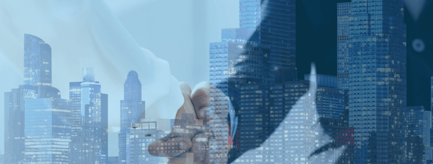 Closing CRE transaction with a handshake overlayed on the skyline of a major city