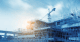 sunset on a construction site with a crane