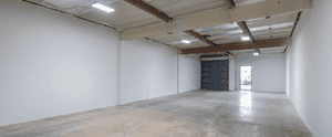 photo of the interior of an empty small-bay unit