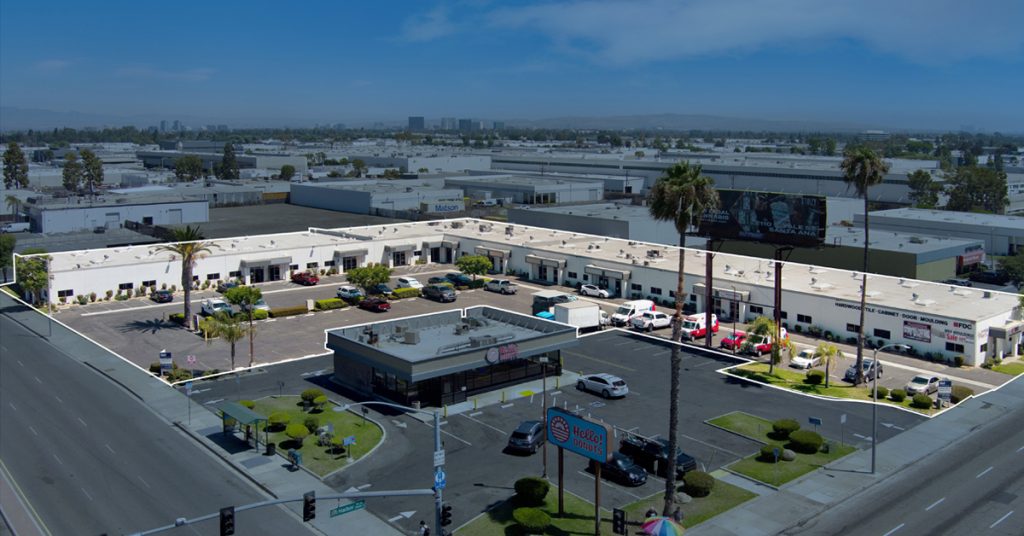 Aerial highlighting Harbor Warner Business Center with background faded