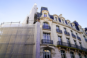 Old building with scaffolding undergoing conversion to hotel property