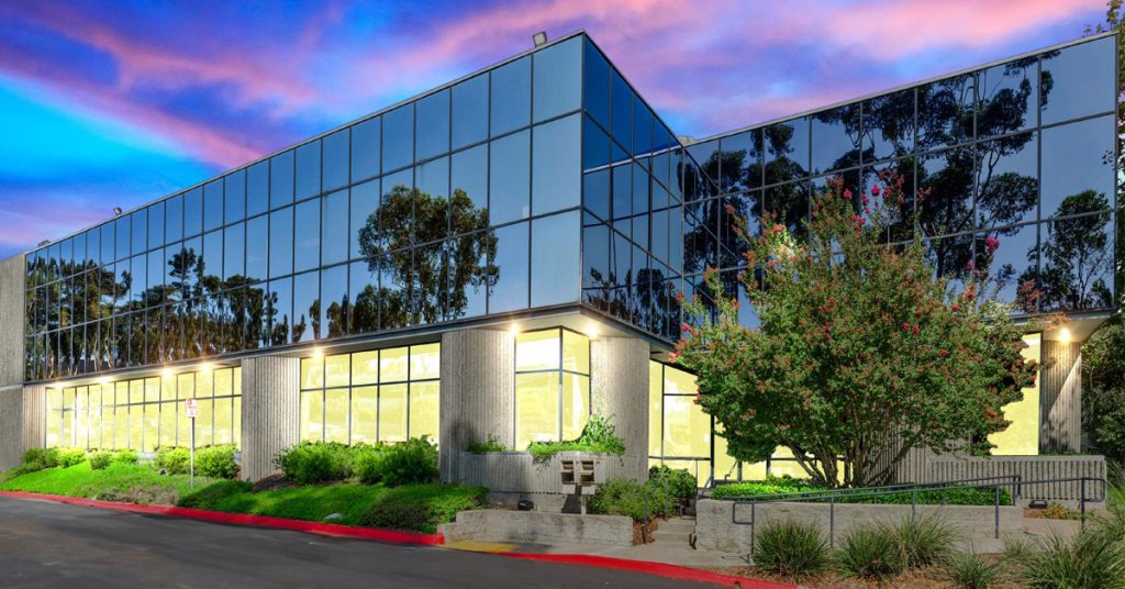 9573-9577 Chesapeake Building with a beautiful blue and pink sky