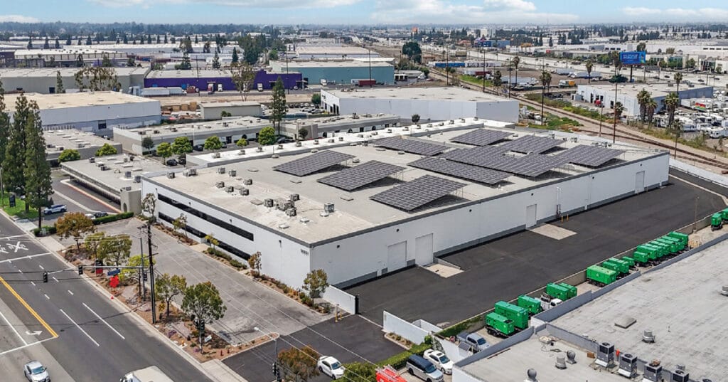 Aerial of 14821 Artesia Boulevard in La Mirada showing the building front and dock area