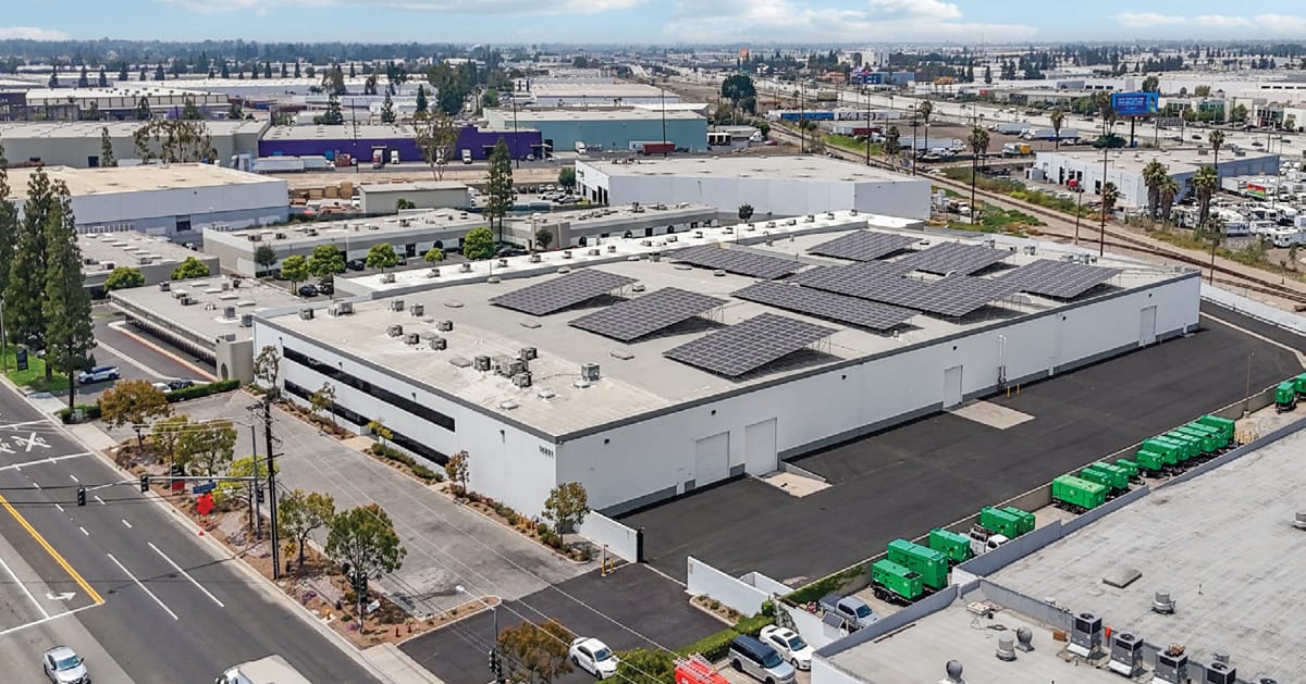 Aerial of 14821 Artesia Boulevard in La Mirada showing the building front and dock area